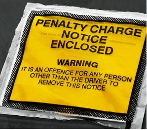 yellow parking ticket. Text: Penalty Charge Notice Enclosed