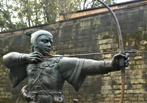 Statue of Robin Hood with bow & arrow