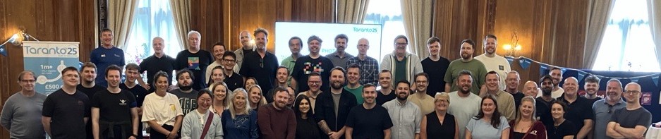 A landscape picture of all of the Taranto Team
