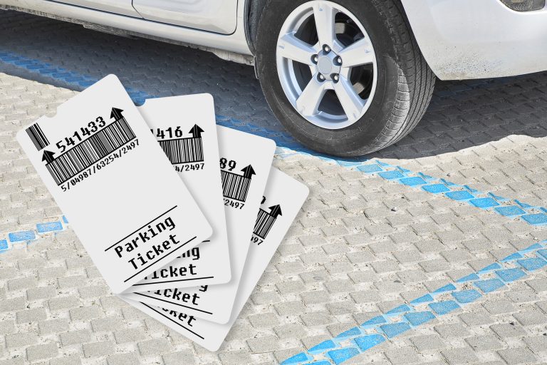 Wheel of a car with 4 tickets